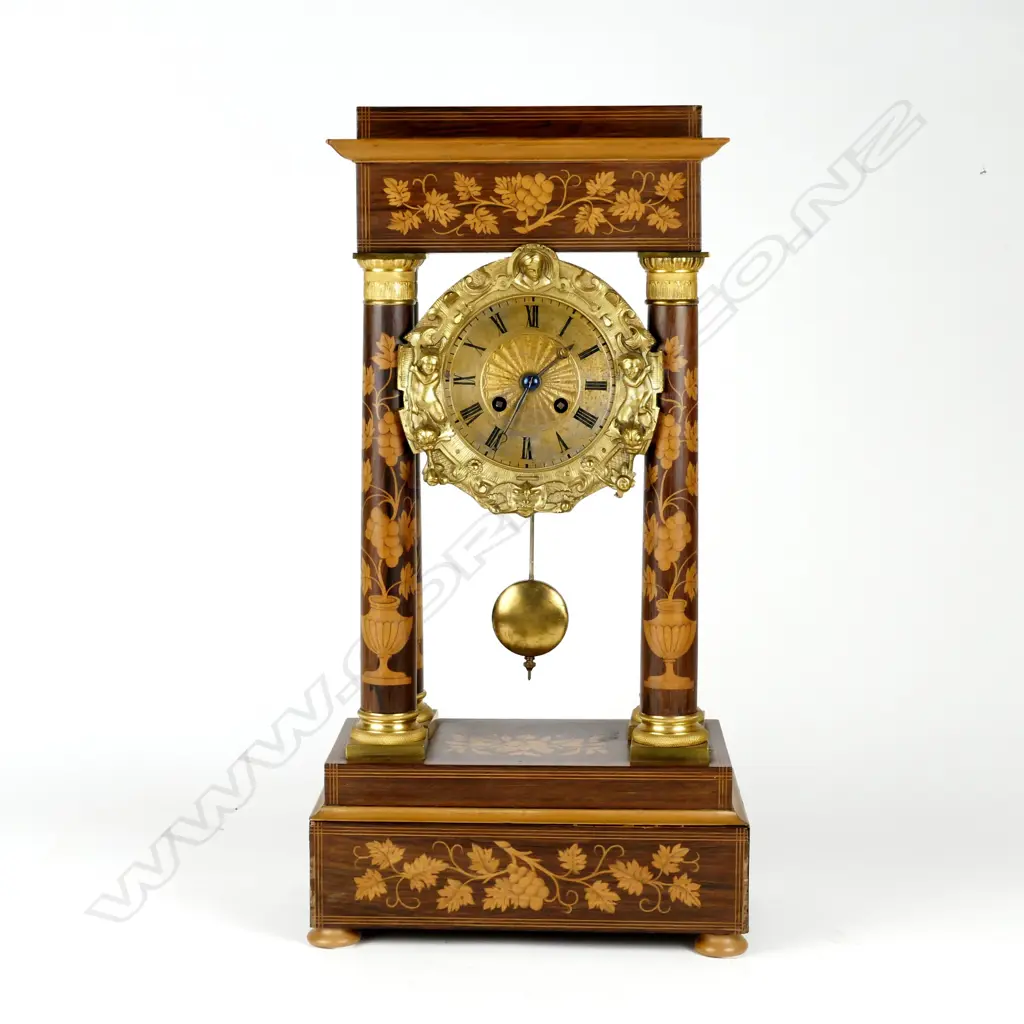 A French 19thC rosewood marquetry portico clock Image 1++