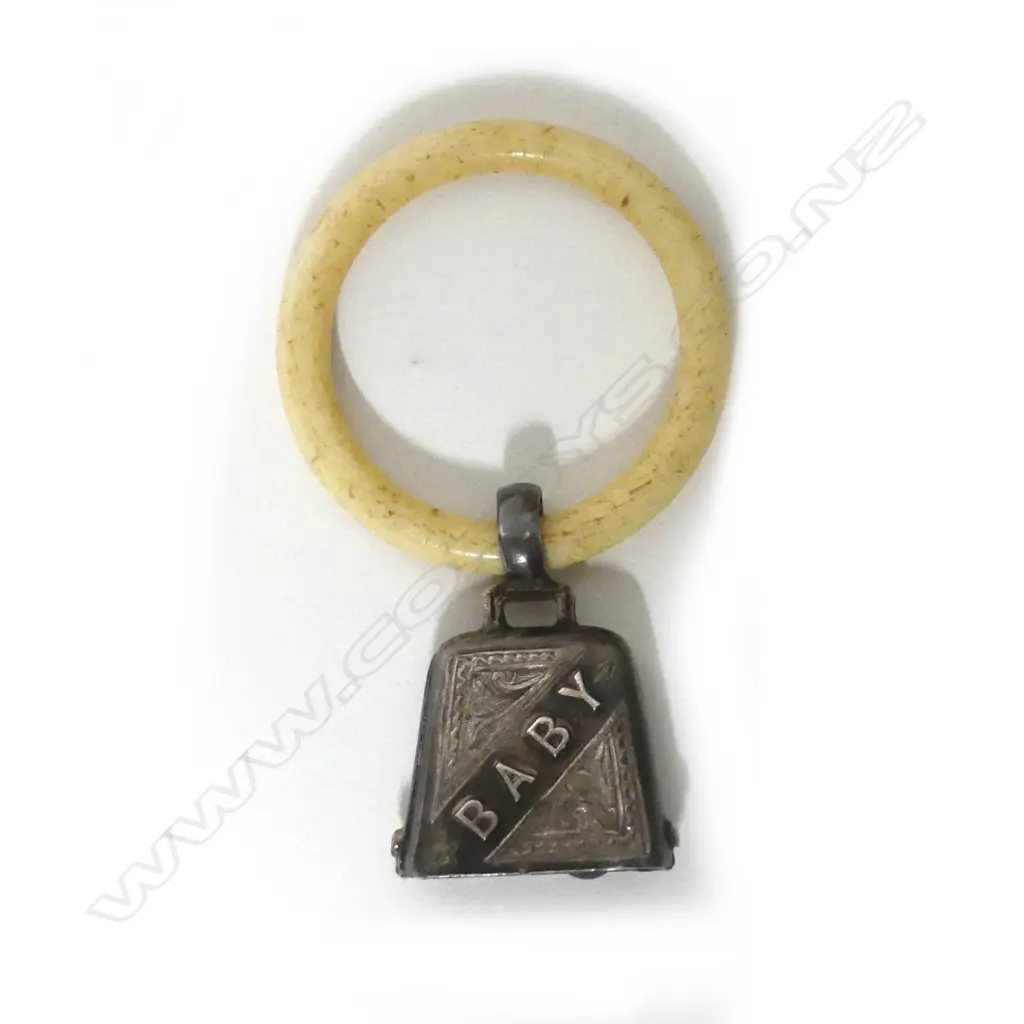 An Edwardian silver and ivory rattle and teething ring Image 1++