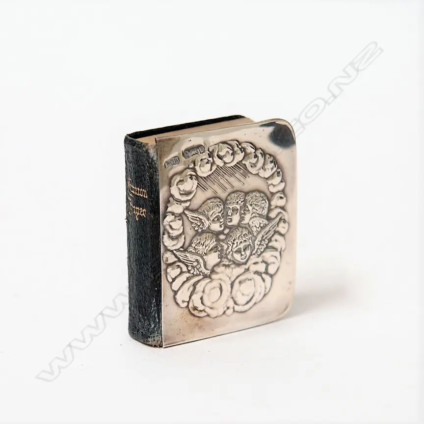 An Edwardian angel embossed silver covered miniature 'Common' Prayer' book Image 1++