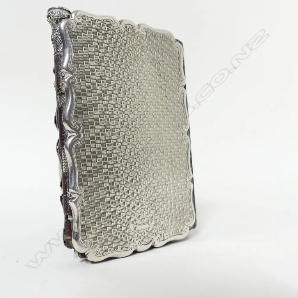 A Victorian silver notebook Image 1++