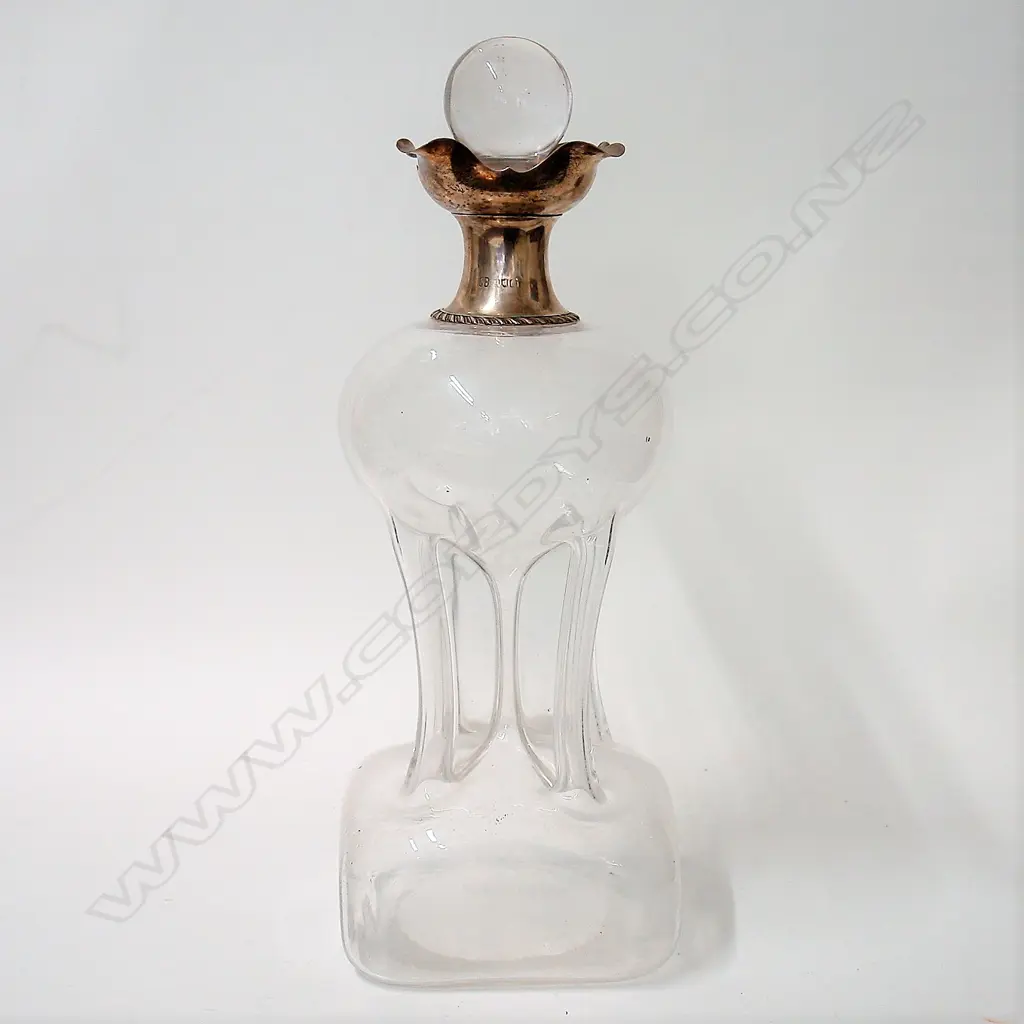 A large and impressive Edwardian glass and silver mounted 'glug-glug' decanter Image 1++