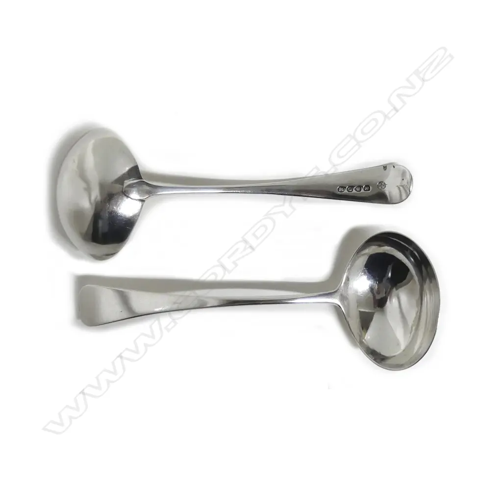 A pair of George III silver ladles Image 1++