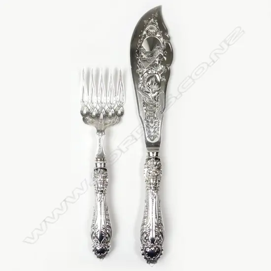 A pair of Victorian silver fish servers