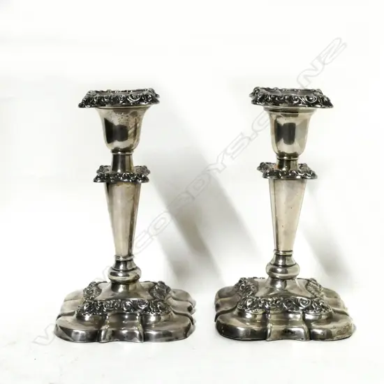 A pair of silver candlesticks