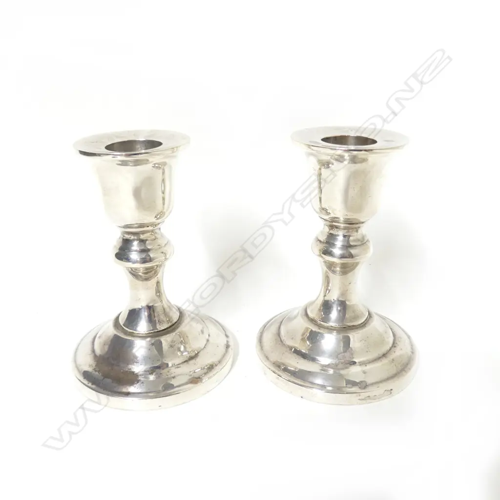 A small pair of sterling silver baluster column candlesticks Image 1++
