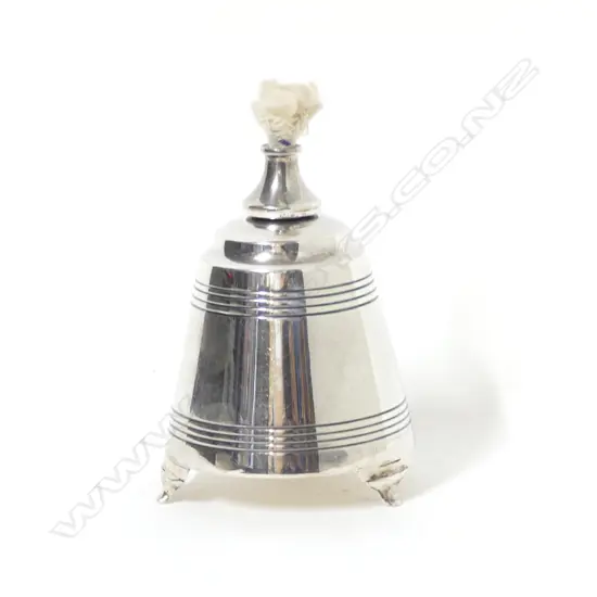 A small unusual silver bell shaped oil lamp