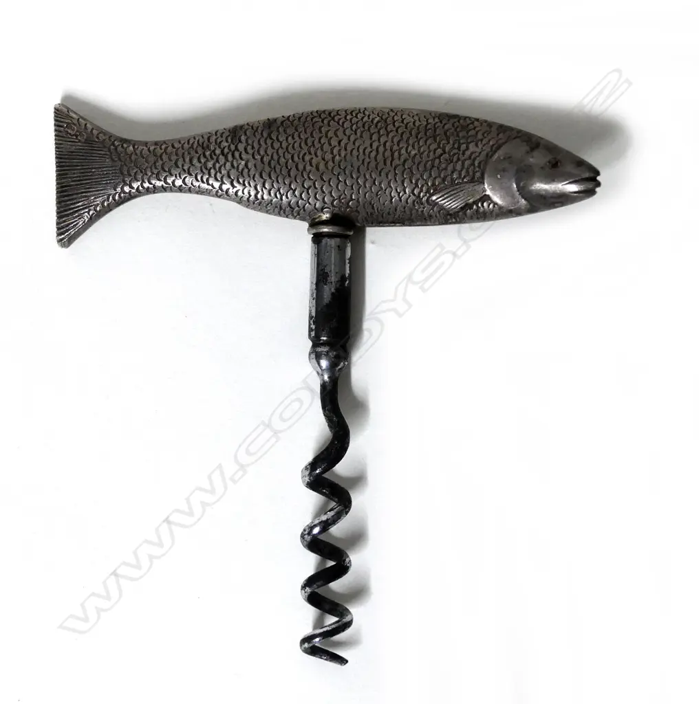 A silver handled corkscrew Image 1++