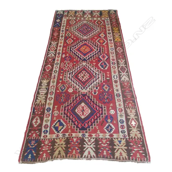 An old Caucasian Shirvan kilim rug