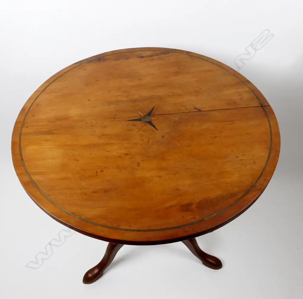 A Biedermeier fruitwood tripod based wine table Image 1++