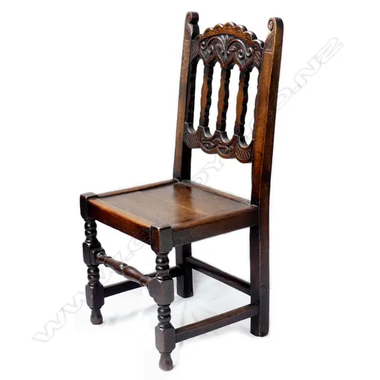 A heavy oak Victorian hall chair
