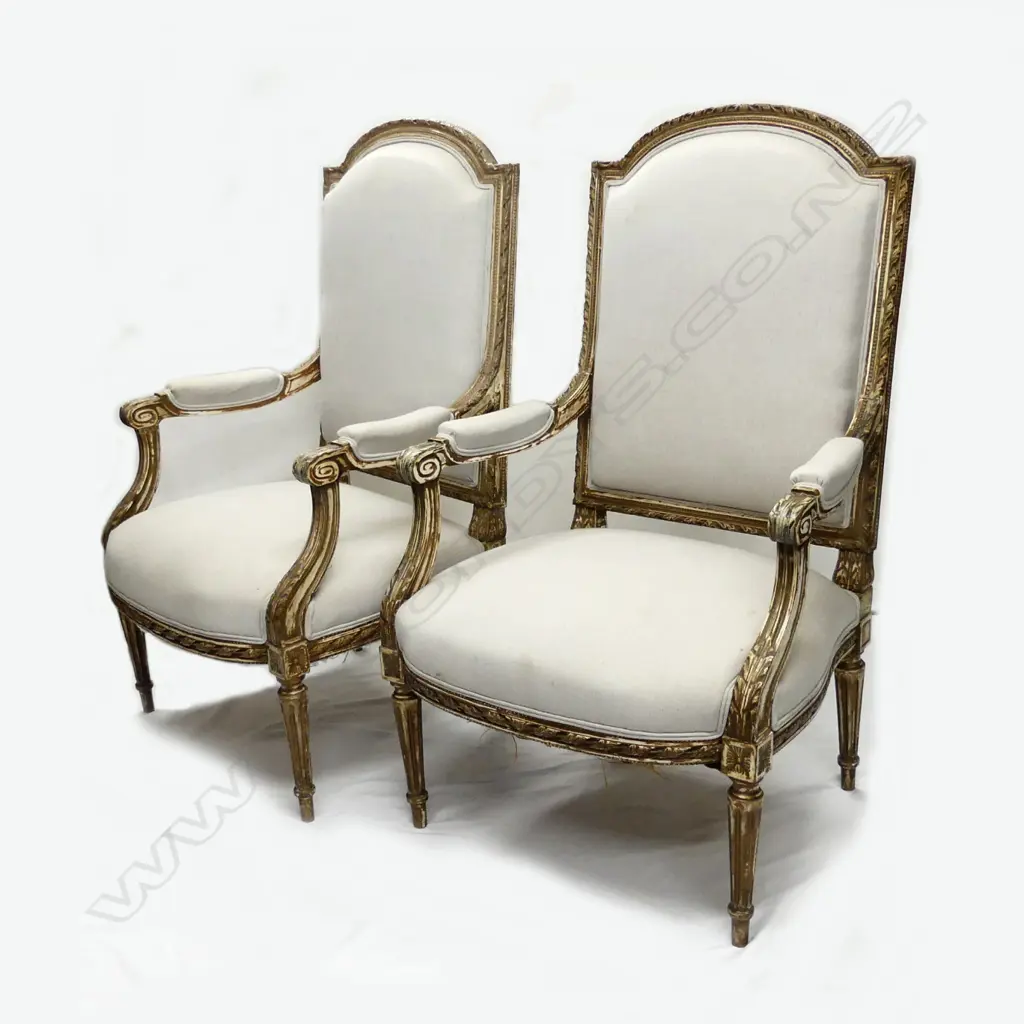 A pair of Italian gilded open elbow armchairs Image 1++