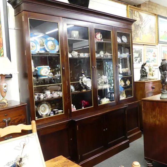 A large and impressive Sefton Powrie glazed breakfront bookcase cabinet