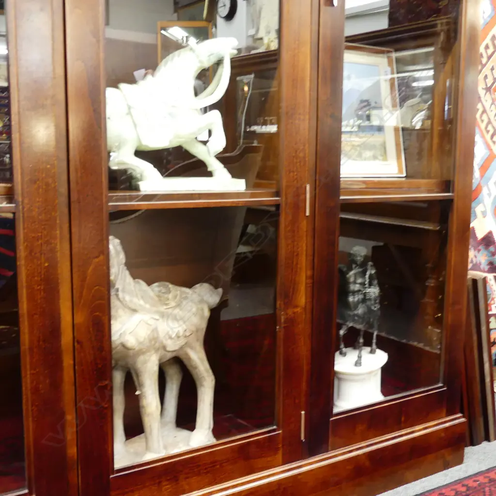 An impressive Sefton Powrie mahogany glazed bookcase Image 1++