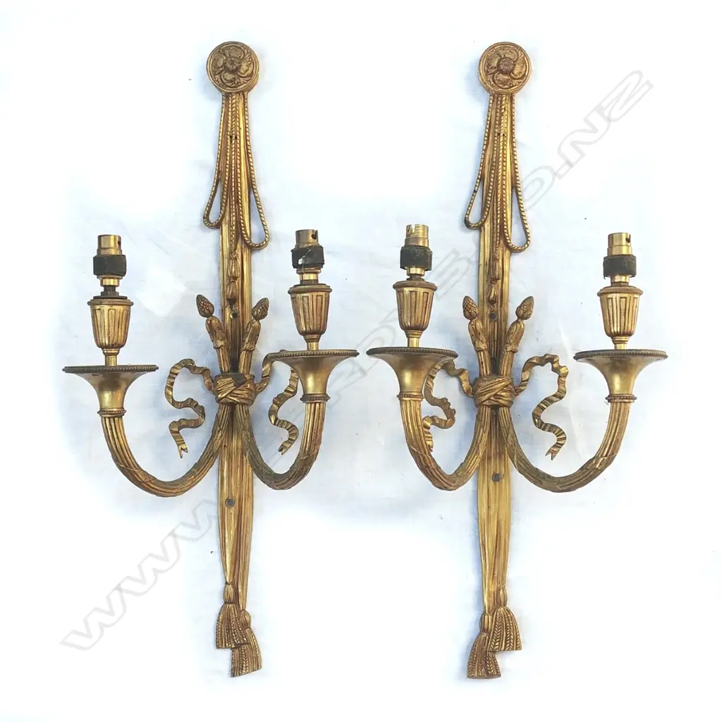 A pair of cast brass twin light wall brackets of French style Image 1++