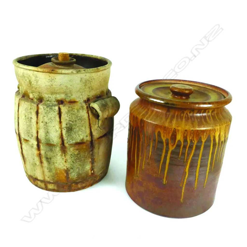 Two large pottery lidded jars Image 1++