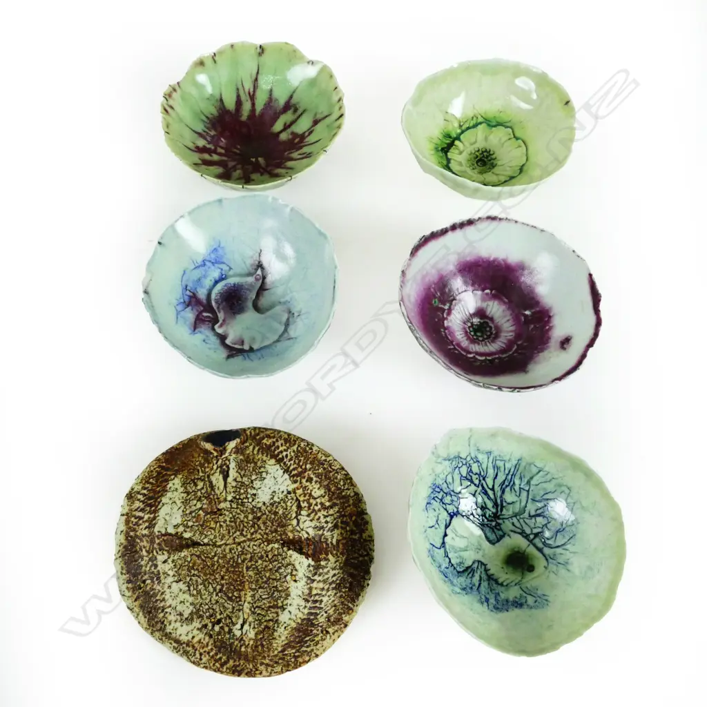 Five small press moulded porcelain dishes Image 1++