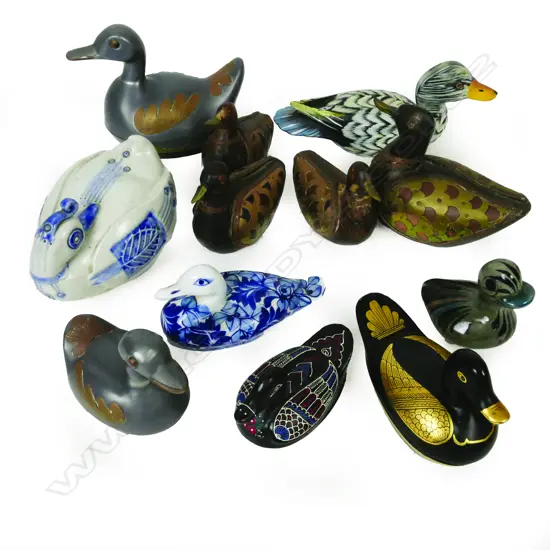 A collection of duck ornaments