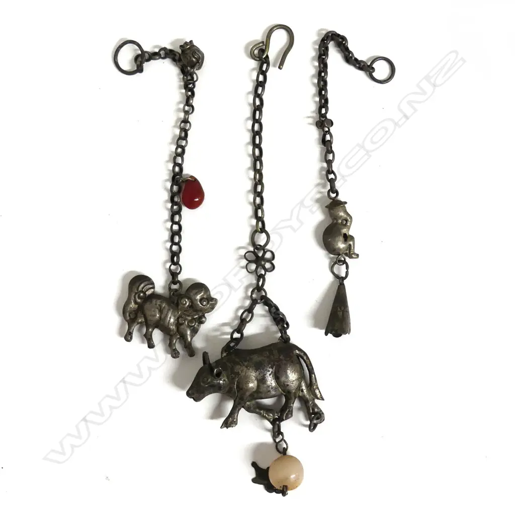 Three Tibetan silver animal charms Image 1++
