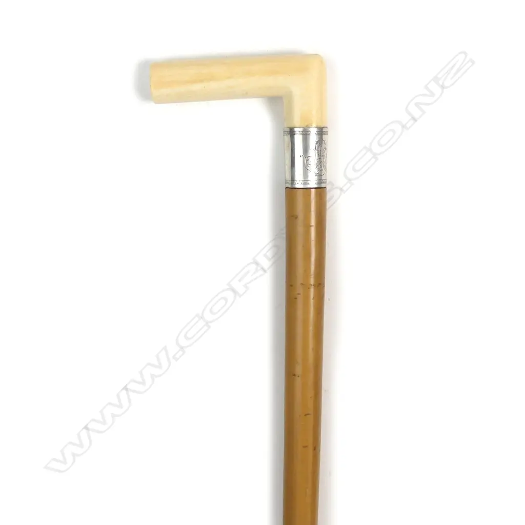 A vintage ivory handled walking stick Image 1++