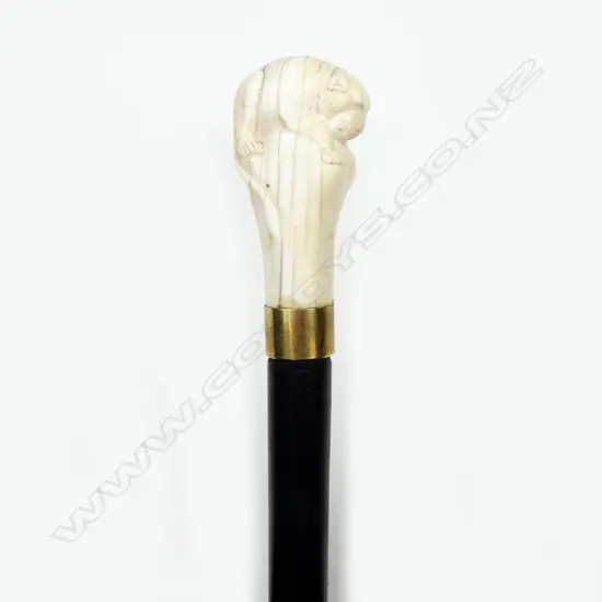 A c.1900 carved ivory tiger handled walking stick