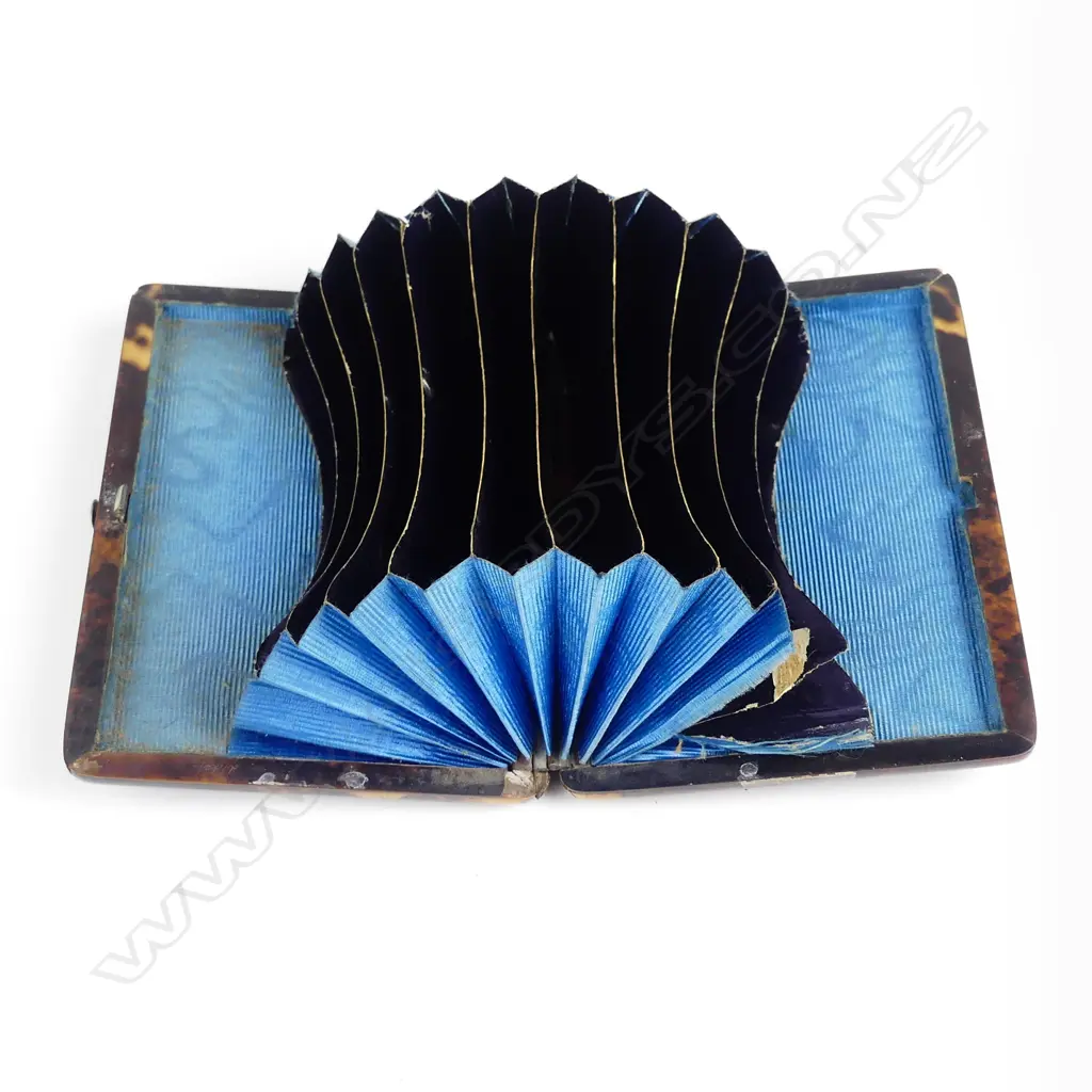 A late 19thC tortoiseshell card case inlaid with silver Image 1++