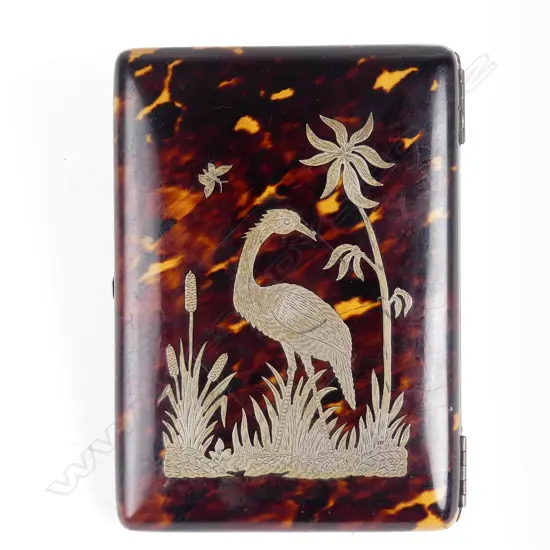 A late 19thC tortoiseshell card case inlaid with silver