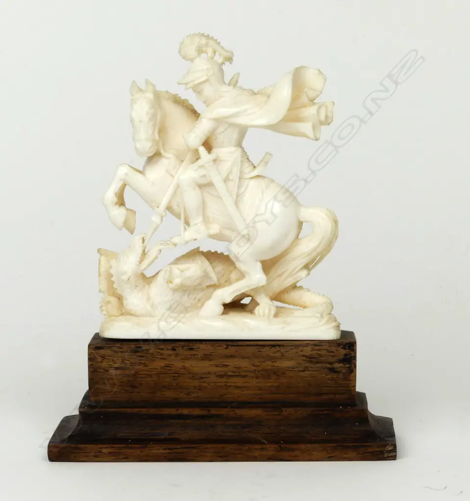 An ivory statuette of St. George killing the dragon Image 1++