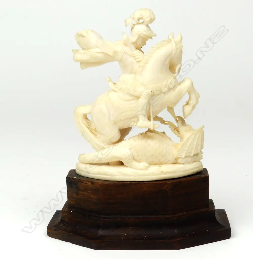 An ivory statuette of St. George killing the dragon Image 1++