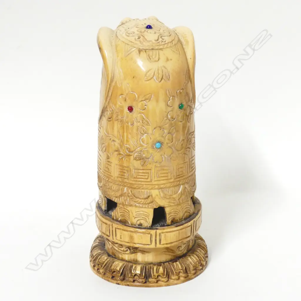 A carved ivory tusk section Image 1++