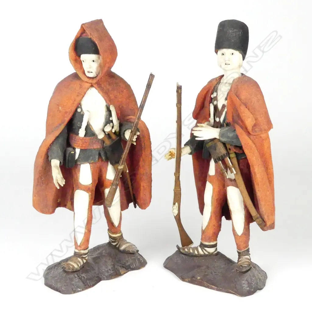 A pair of Eastern European carved wood and bone figures of fighters Image 1++