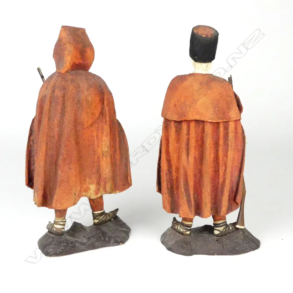 A pair of Eastern European carved wood and bone figures of fighters Image 1++
