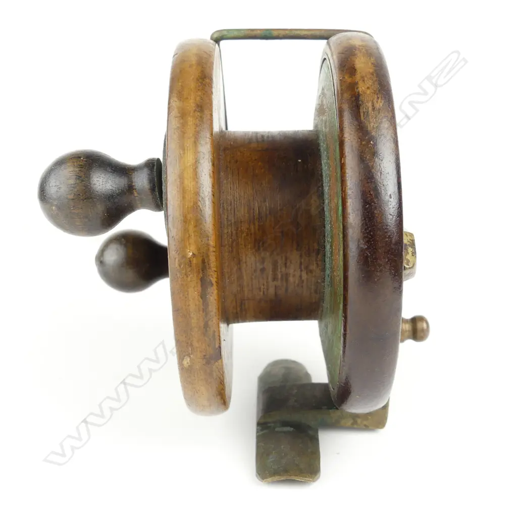 A 4" walnut star back reel made for McCarthy's Dunedin c.1910 Image 1++