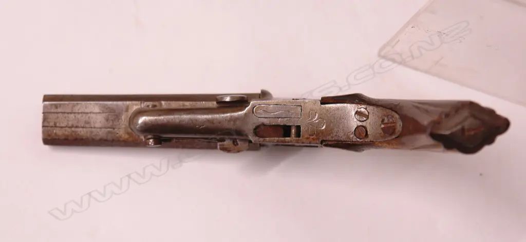 An antique .32cal double barrel pocket pistol Image 1++