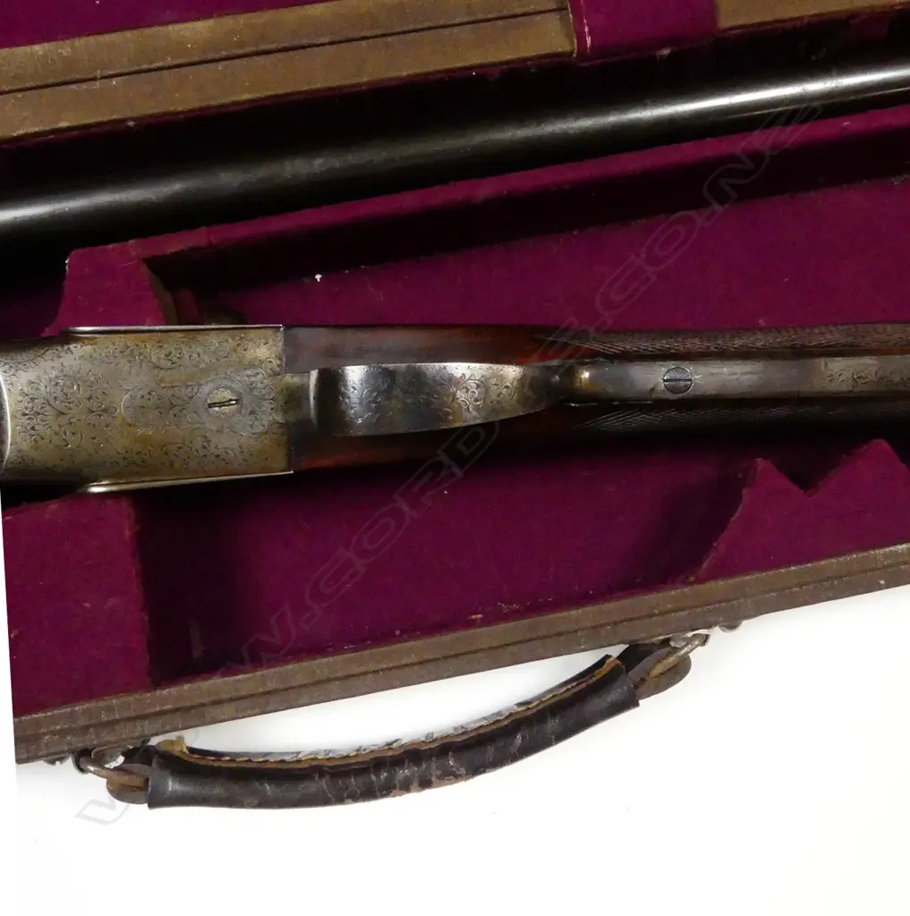 A Holloway & Naughton 12 gauge double barrel shotgun Image 1++