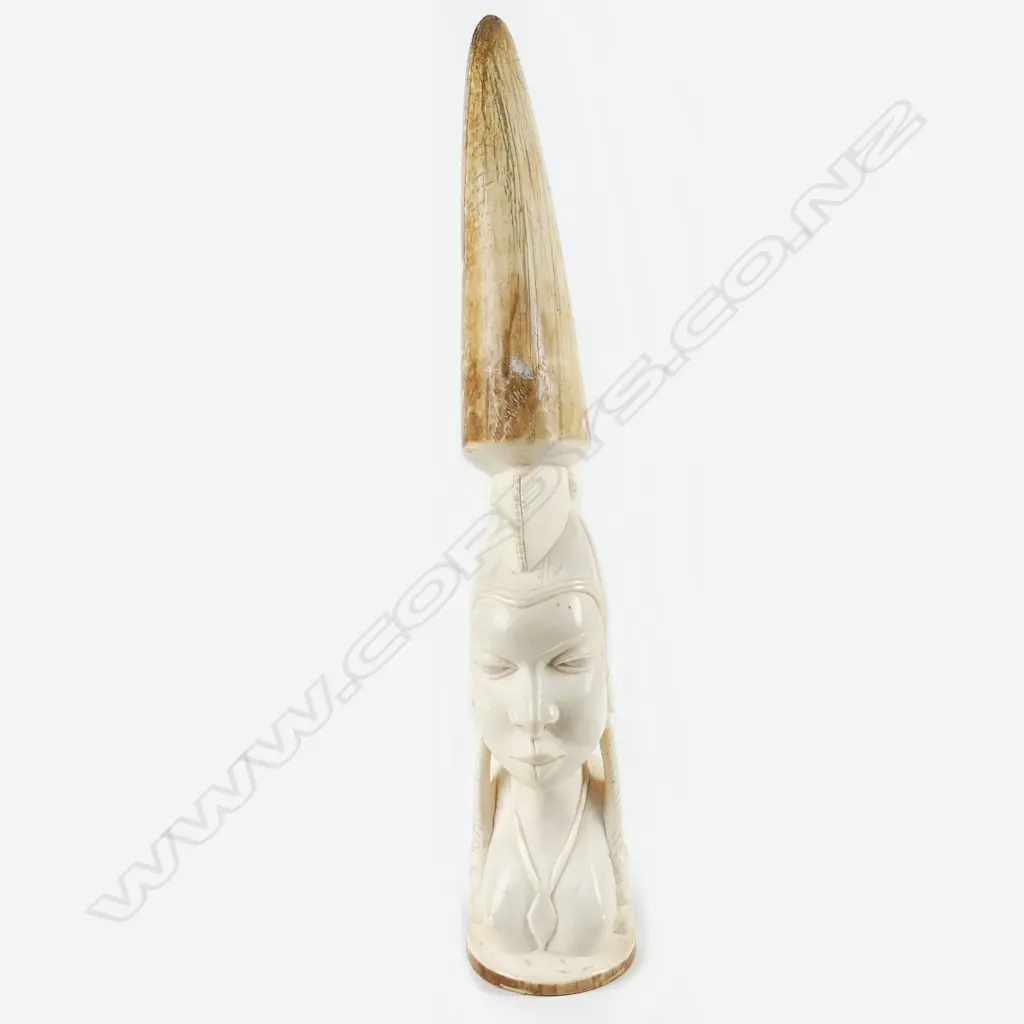 An African carved ivory female bust tusk section Image 1++