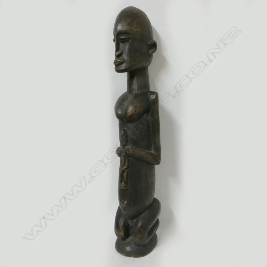 A vintage carved Dogon figure Image 1++