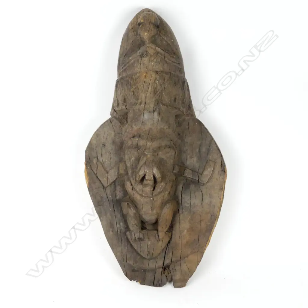 A carved wood house totem Image 1++