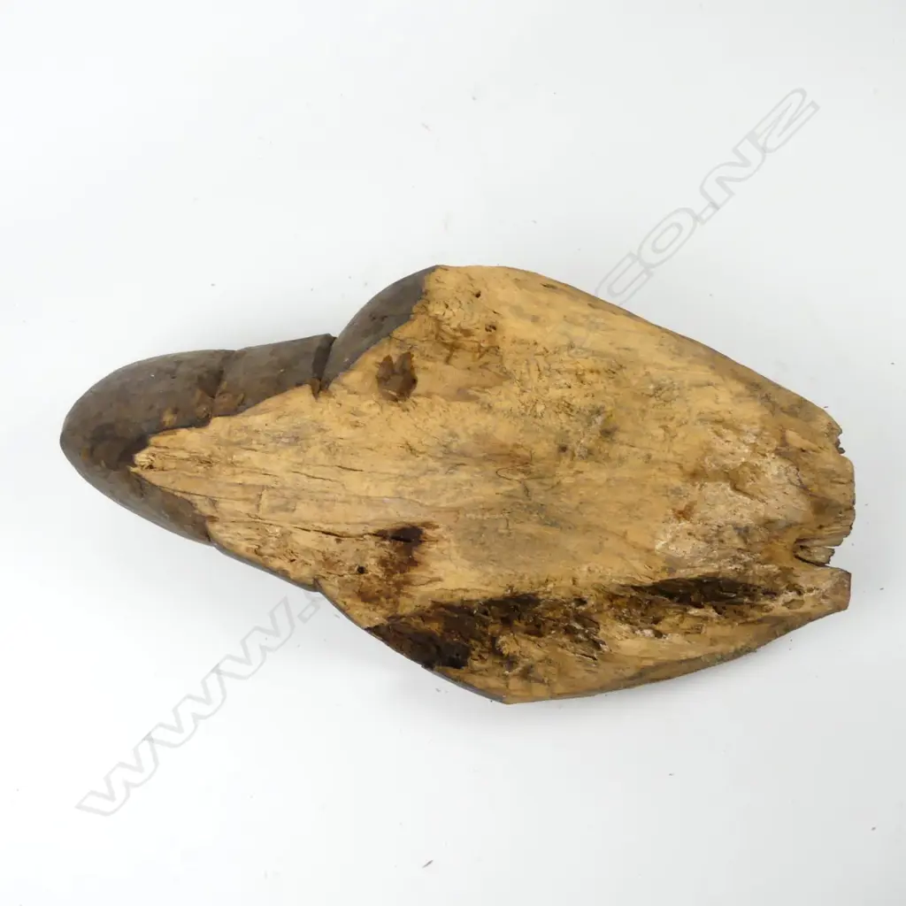 A carved wood house totem Image 1++