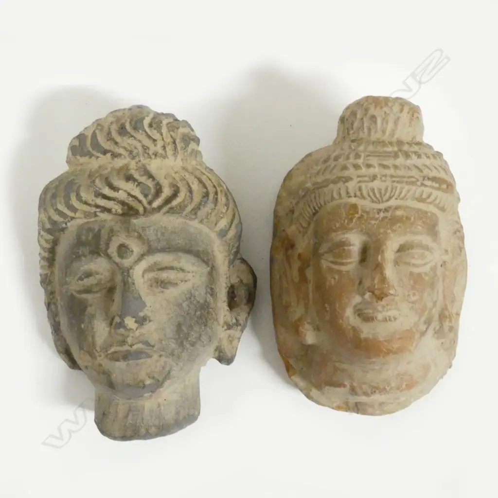 Two terracotta Buddhist portrait busts Image 1++