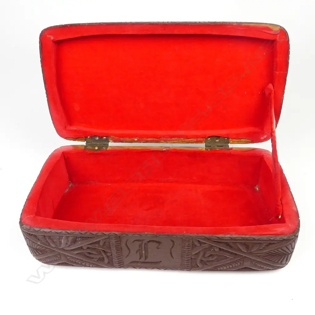 A 1930/40s New Zealand Maori carved treasure box of rectangular form Image 1++