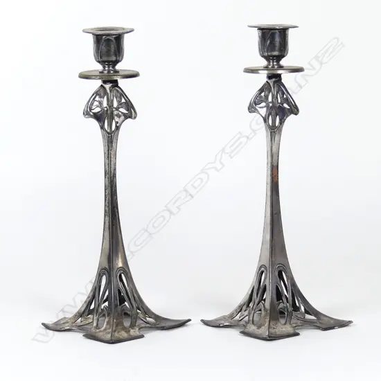 A pair of WMF silver plated candlesticks