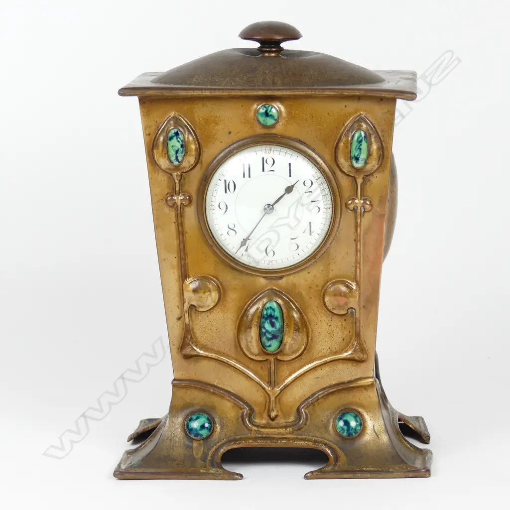 An Arts & Crafts copper mantel clock Image 1++