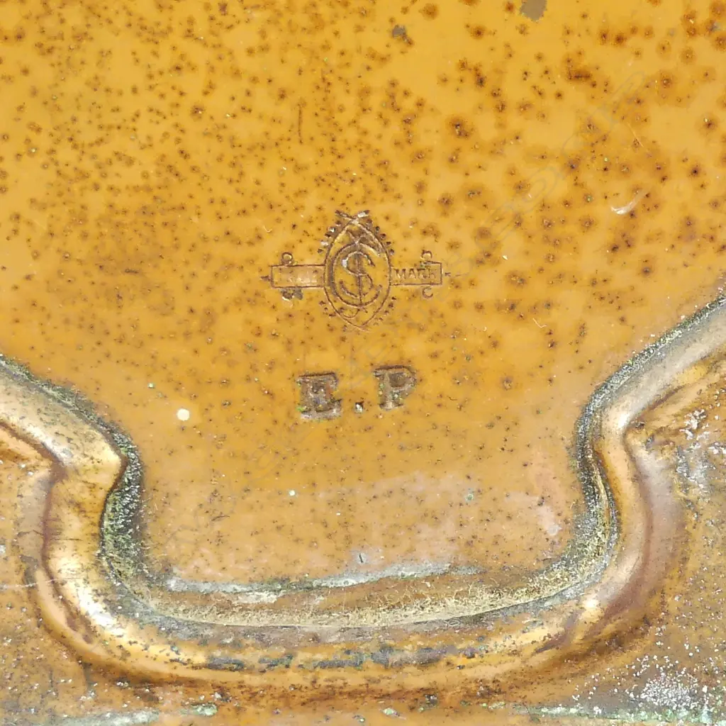 An Arts & Crafts copper mantel clock Image 1++