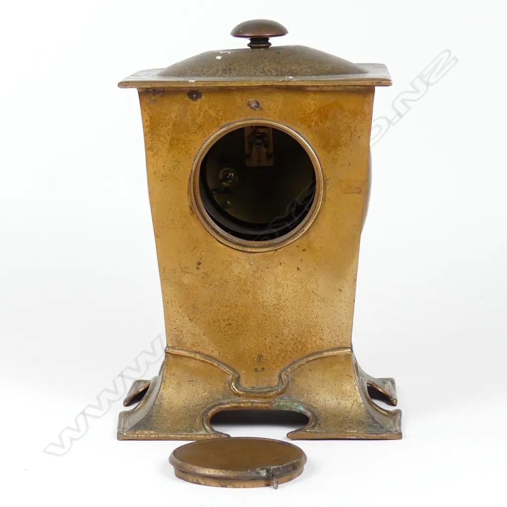 An Arts & Crafts copper mantel clock Image 1++