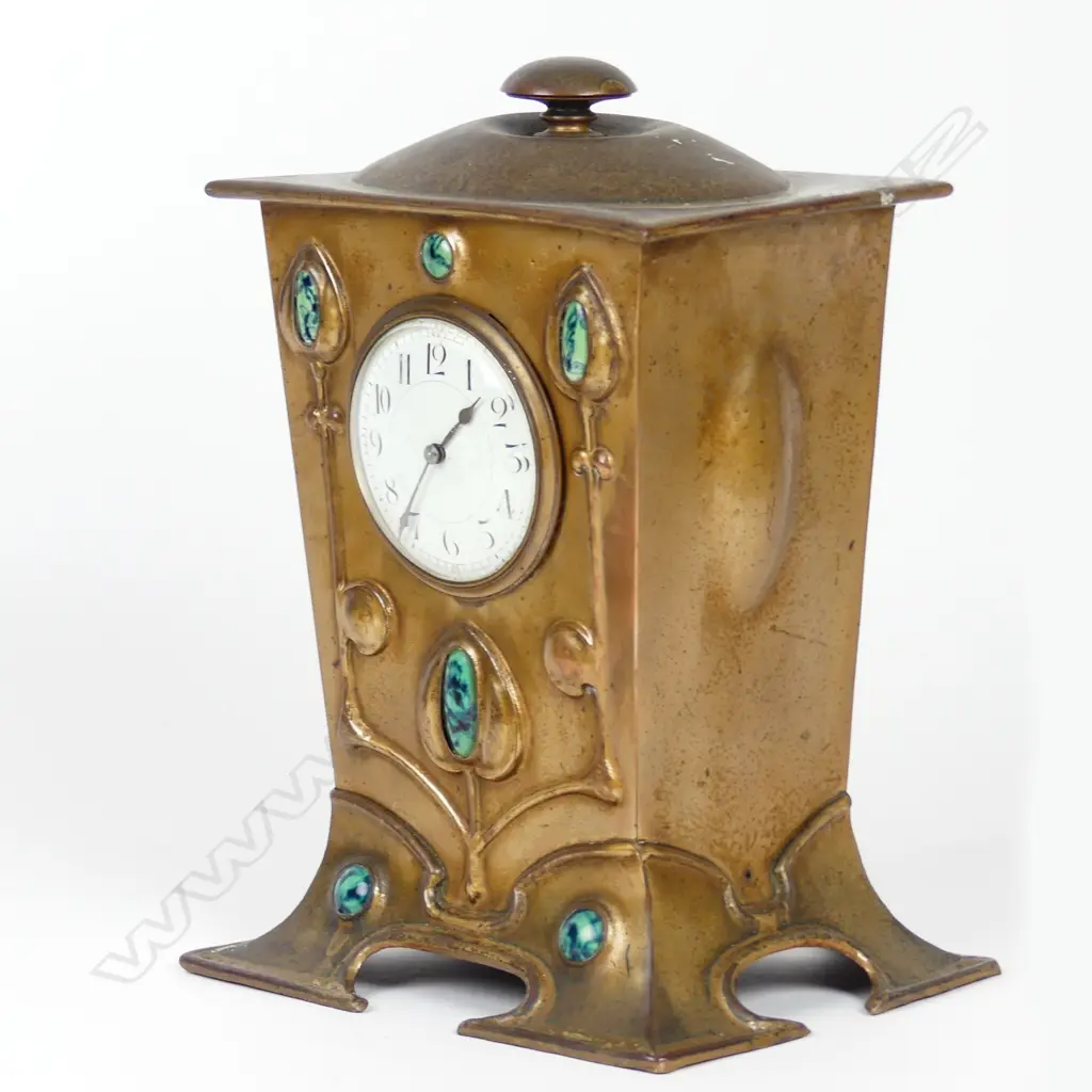 An Arts & Crafts copper mantel clock Image 1++