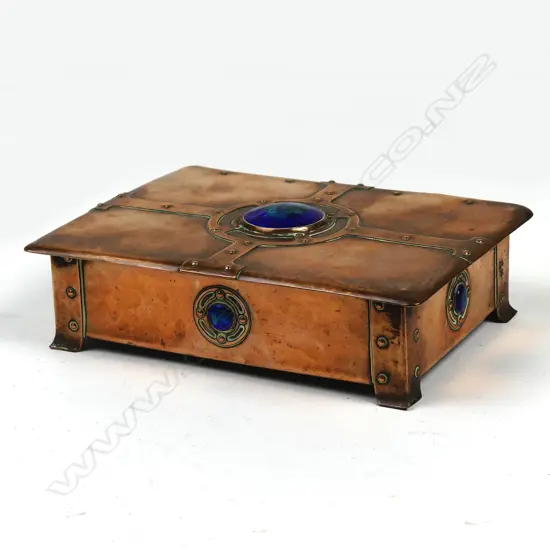 An Arts & Crafts hammer finish copper cigarette box