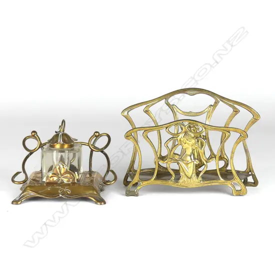 A brass Art Nouveau letter rack