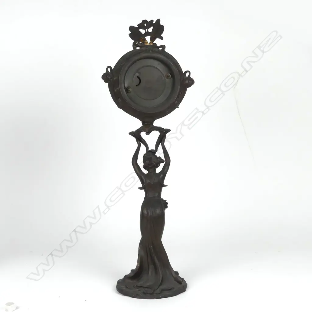 An Art Nouveau spelter bronze figural based clock Image 1++
