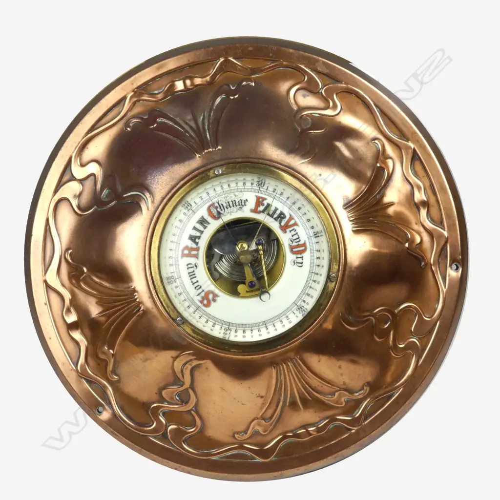 An Art Nouveau copper framed aneroid barometer Image 1++