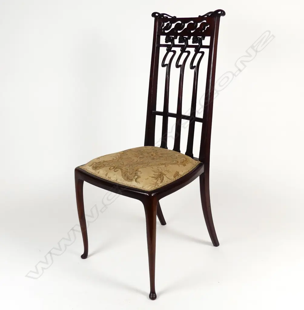 An Art Nouveau walnut salon chair Image 1++